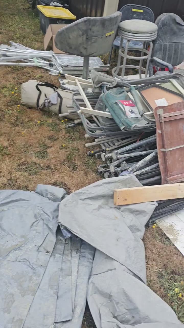 A big assortment of folding and camp chairs