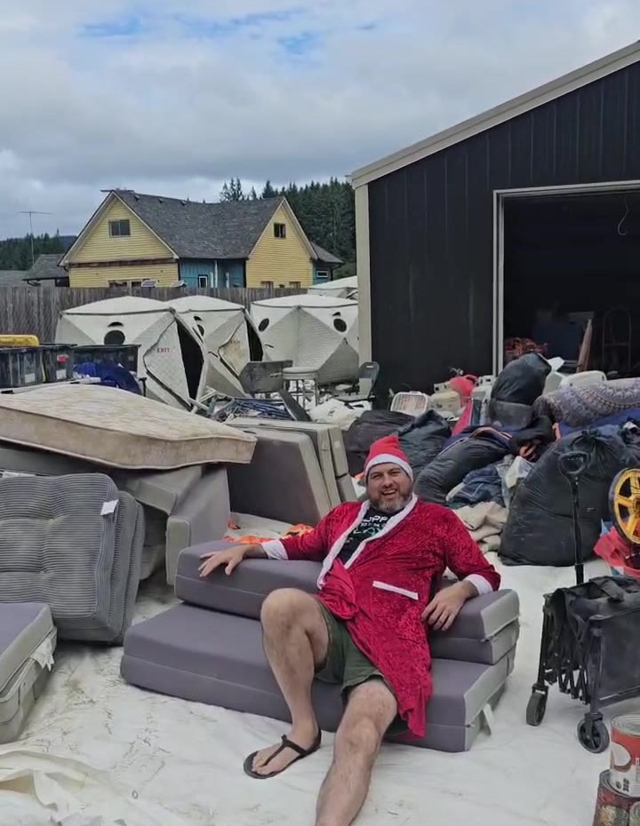 Santa lounging on the queen trifold couch