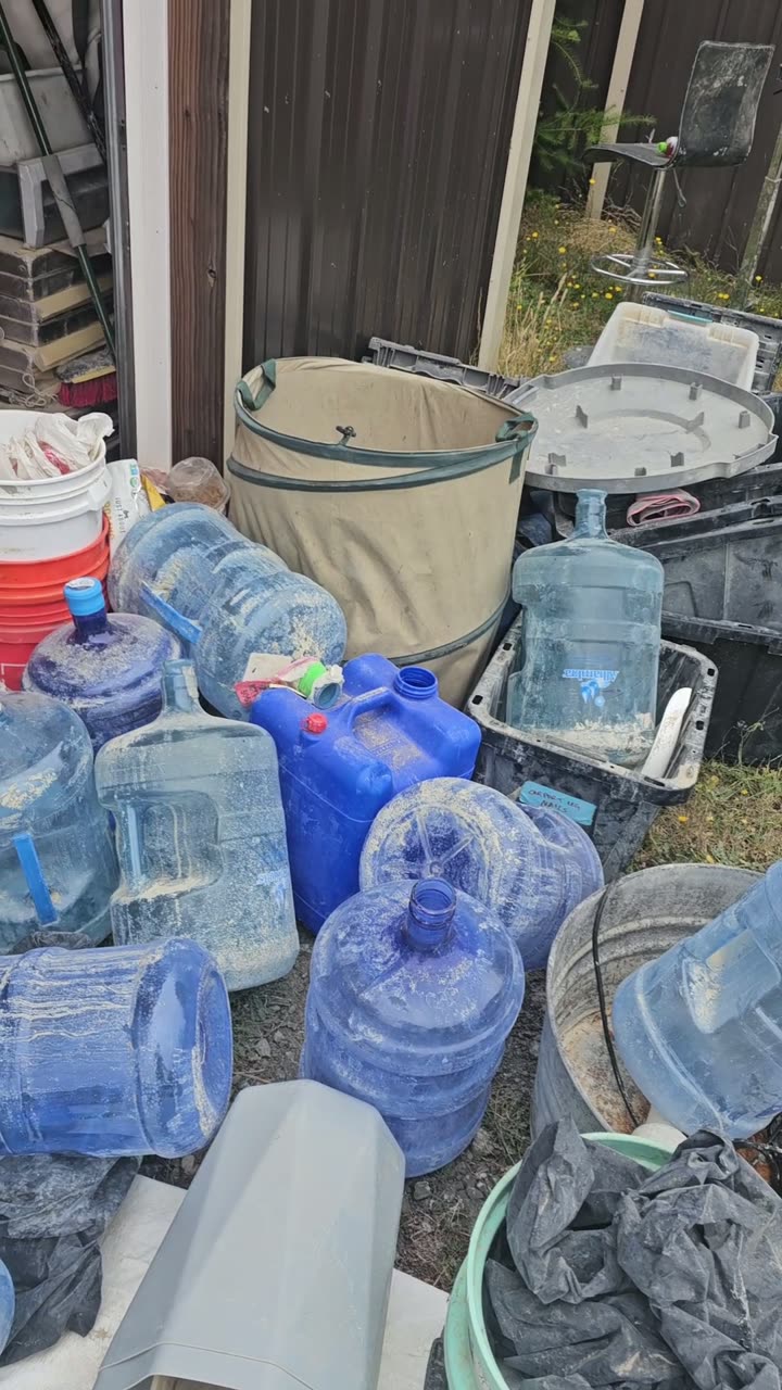 Stacks of 5 gallon water jugs